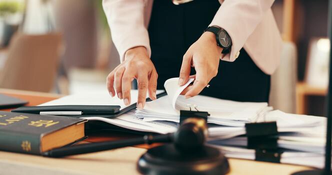 Legal professional reviewing recovery documentation
