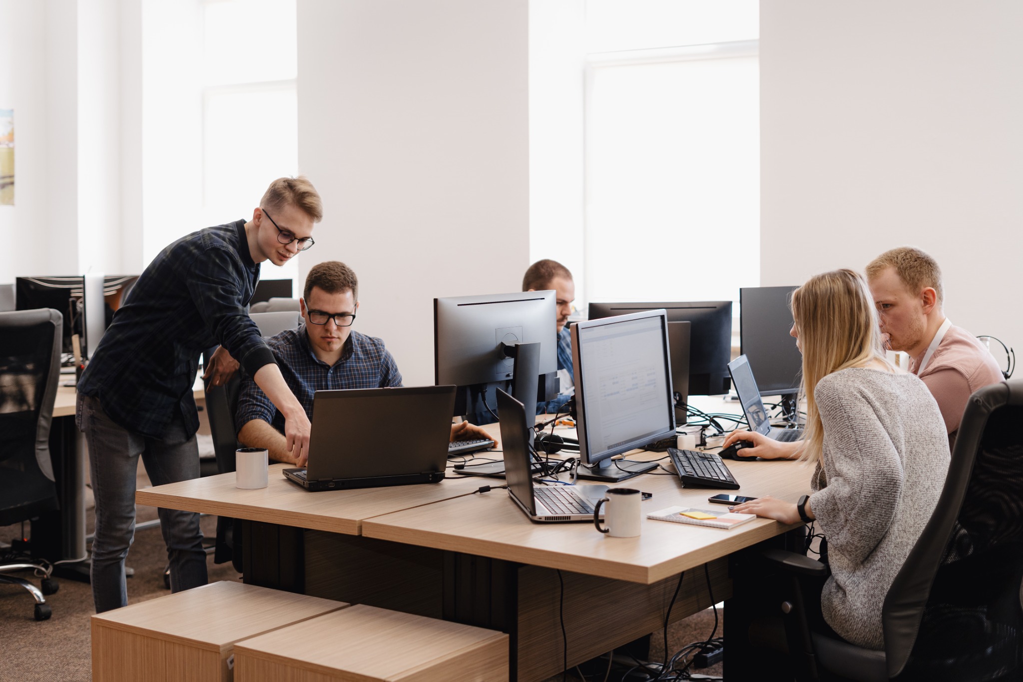 Professional team collaborating in a modern office